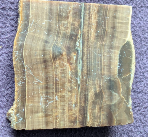 Possibly polished slab of - a,